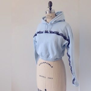 Adidas cropped hoodie sweatshirt with elastic band and logo across chest/sleeves